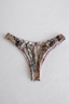 Reversible bikini bottoms with Prairie Girl and Gma’s House prints, white lace trim, cheeky medium coverage.