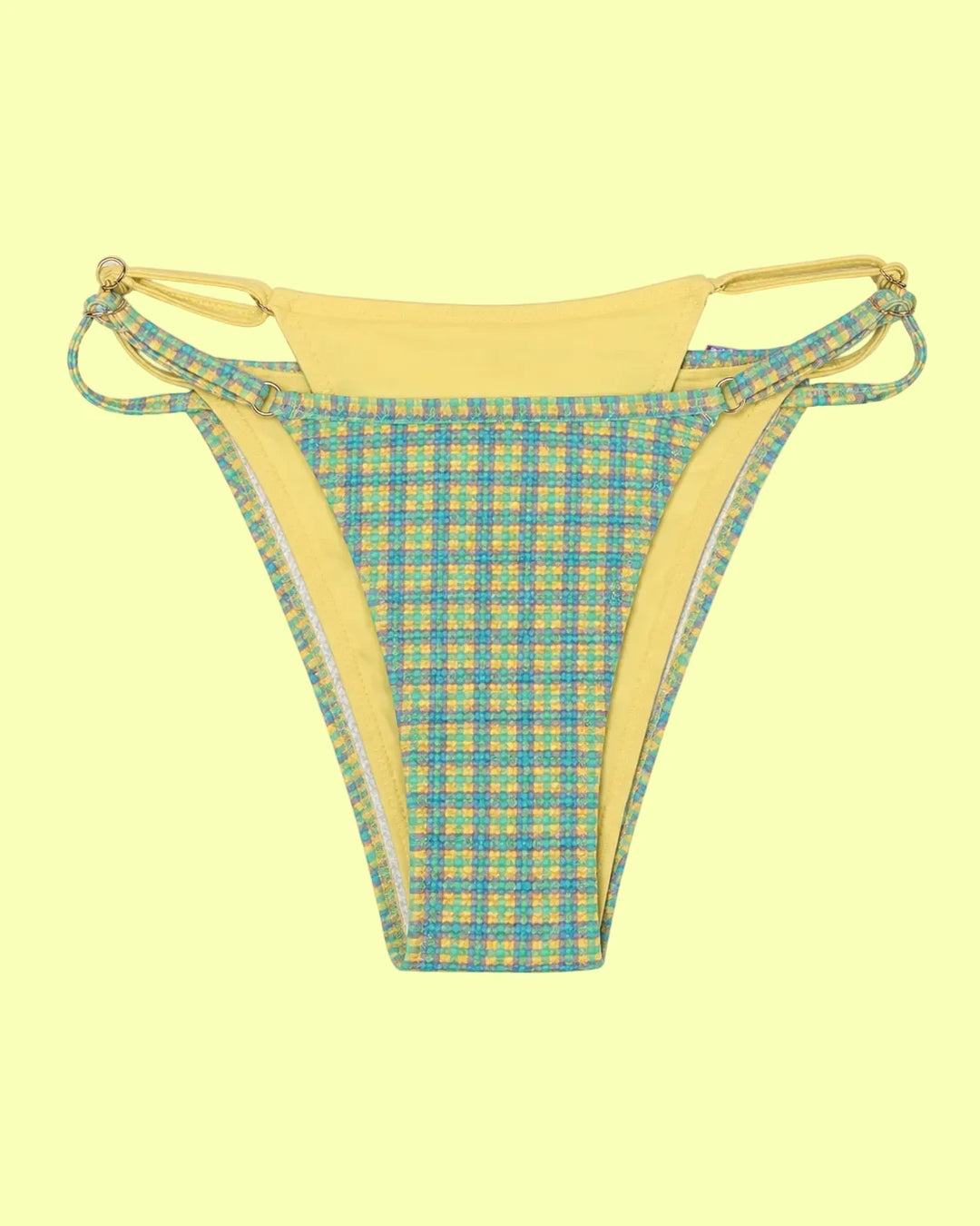 Tequila Swim Mikayla Half Ass Bottom in Starfruit blue and yellow geometric print, flat lay view